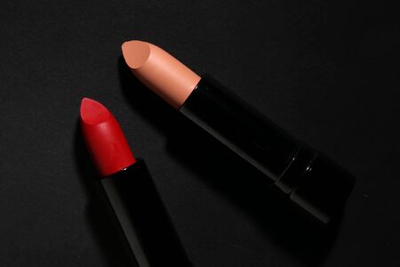Lipstick. Fashion Colorful Lipsticks over black background. Lipstick tints palette, Professional Makeup and Beauty. Beautiful Make-up concept. Lipgloss. Lipsticks closeupの写真素材