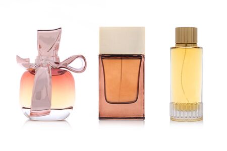 Studio photo of set of luxury perfume bottles. Isolated on white backgroundの写真素材