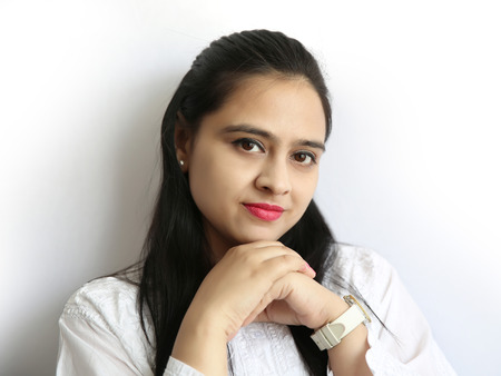 A portrait of a beautiful young indian woman on white Background