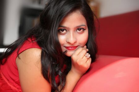 Attractive indian brunette woman isolated on white backgroundの写真素材