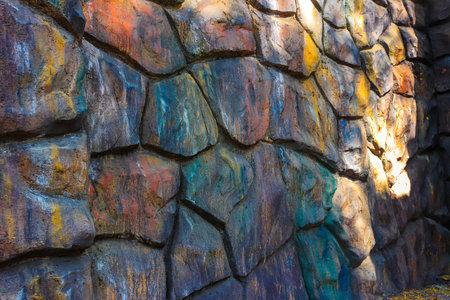 Rainbow colored stone wall, stones textureの写真素材