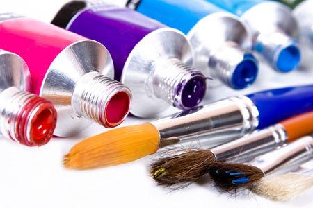 tube of paint with paintbrush