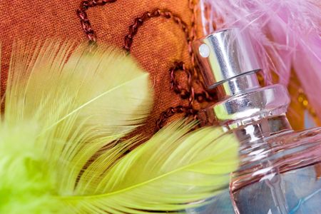 bottle of parfum on orange backgroundの写真素材