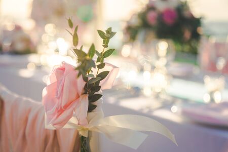 Flower on the chair in Wedding ceremony in the sunset time.の写真素材