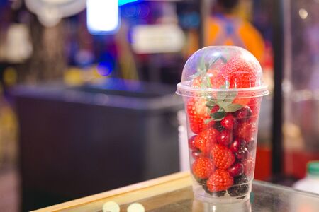 Plastic Mix berry put inside a cup showing in the market