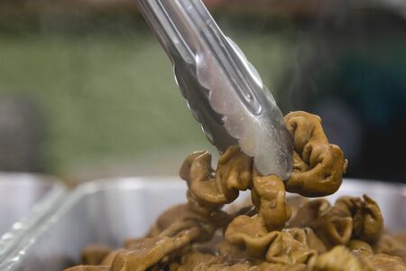 grab chicken intestine boil come up with warming smoke prepare for make some cook in Thai styleの写真素材
