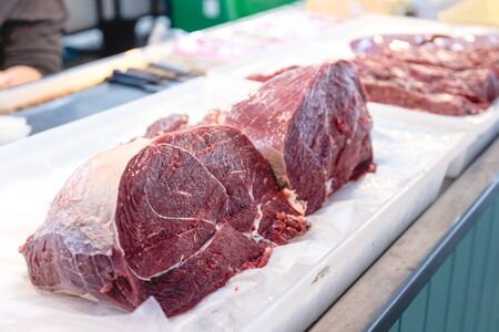 big piece of beef look fresh show on butcher shopの写真素材