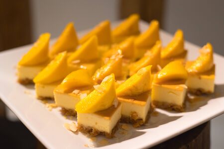 soft cream cake with topping for party buffet in hotel hallの写真素材