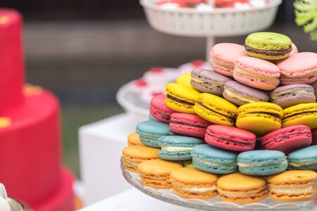 Macaroon put together in pattern on glass plate in party to let quest take them for dessert after mealの写真素材