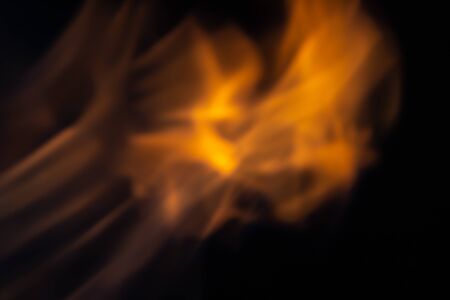 Soft blur flame with some detail on black background. For overlay effect