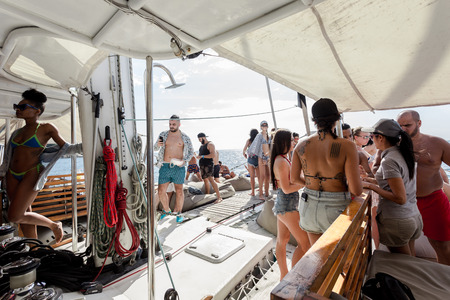Phuket, Thailand - 17 January 2018: on luxury boat party with many foreign people have fun