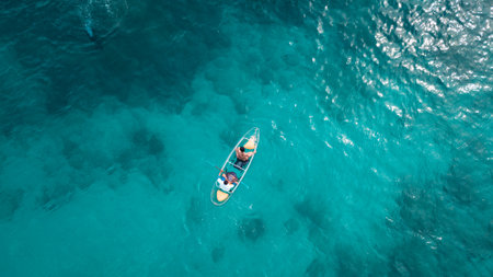 Tourist sail kayak on the sea, with top view from drone.