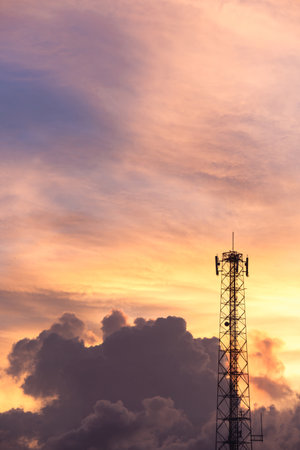 Landscape view of eveing cloudy sky with electric pole.の写真素材