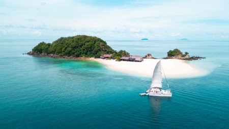 Koh Kai nai from drone view, with one katamaran boat park there, look clean without people.