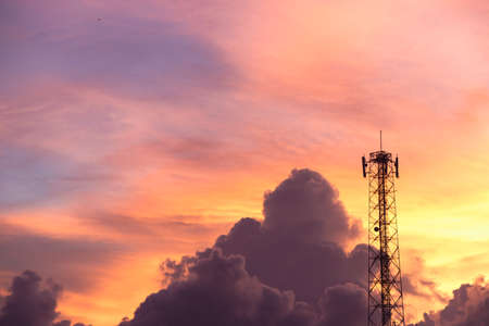 Landscape view of eveing cloudy sky with electric pole.