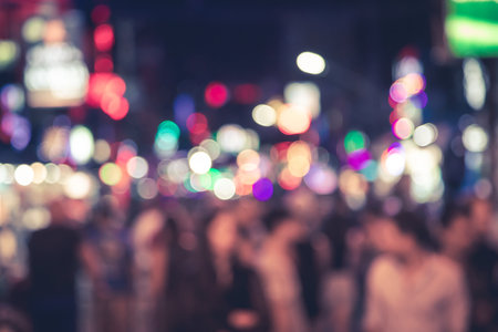 Light blur defocused of bangla road in Patong city, night time with many people walking around to drinking shop and partyの写真素材