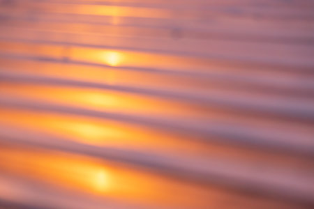 blur closeup metalic roof pattern with some dirty stain, have yellow light shine on at night timeの写真素材