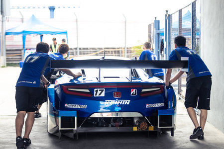 Buriram, Thailand - 28 June 2019 : Chang SuperGT race match, One of Japanese team - Keehin, pushing their racing car team together in the tunnelのeditorial素材