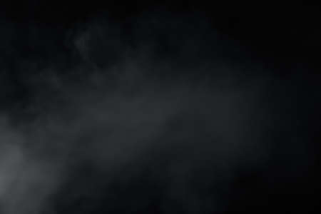 Smoke spread around so soft on black background. Like soft blur fogの写真素材