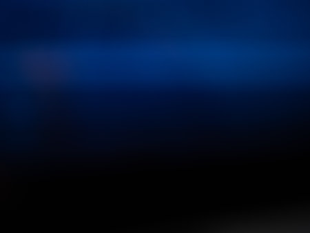 This captivating abstract blue background features subtle texture effects, perfect for design...