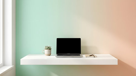 A serene modern workspace featuring a laptop on a sleek shelf, accompanied by a succulent plant and a minimalist notebook, ideal for remote work or study.の素材