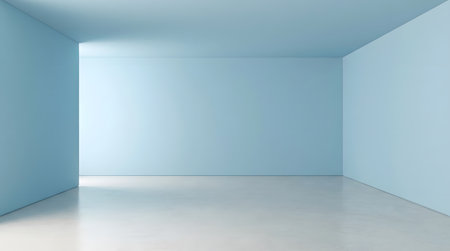 A serene, spacious room featuring soft blue walls and a smooth floor. The minimalist design creates an inviting atmosphere perfect for creativity or relaxation.の素材