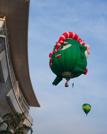 PUTRAJAYA, MALAYSIA - MARCH 30   Colourful and multi shaped hot air balloons flying at the 5th Putrajaya International Hot Air Balloon Fiesta in Putrajaya, Malaysia on March 30, 2013  のeditorial素材