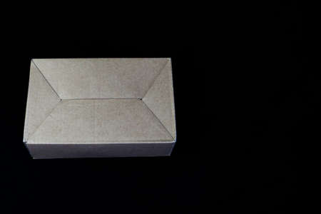 Cardboard Box isolated on black backround