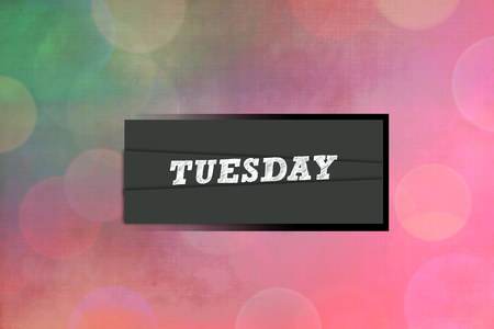 TUESDAY text on pink abstract backgroundの写真素材