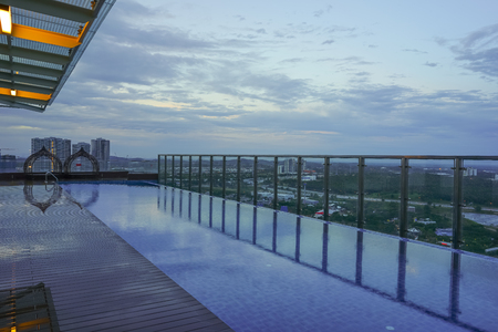 Sunrise with a wooden deck in the foreground. There is copy space in the image.の写真素材