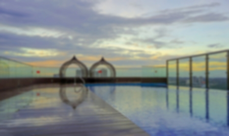 Sunrise with a wooden deck in the foreground. There is copy space in the image.の写真素材