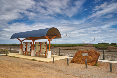 Wind turbines against a blue skyの写真素材
