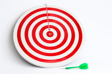 Dart board and dart on isolated white backgroundの写真素材