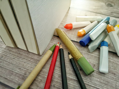 Stack of books and art or office suppliesの写真素材