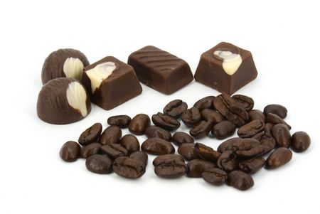 confectionery with coffee-beans in white backgroundの写真素材