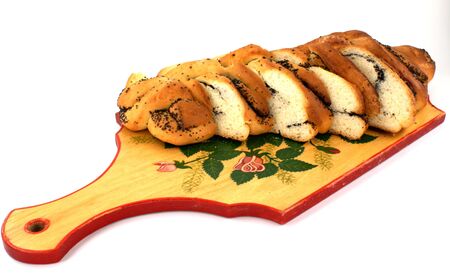 home-made bun with poppy-seed on wooden plantの写真素材