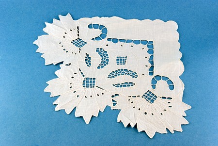 embroidered napkin on blue backgroundの写真素材
