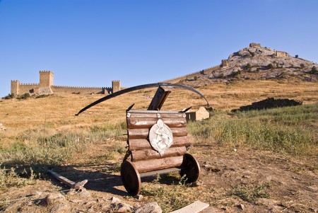 ancient arbalest against Genoese towerの写真素材