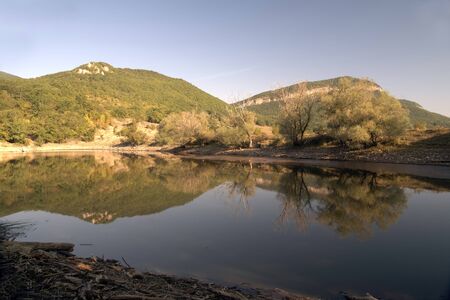 reflection an mountains in lake の写真素材