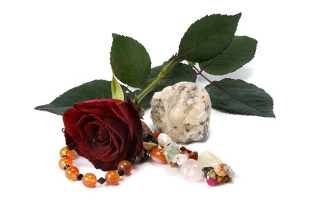 gemstones and rose on white backgroundの写真素材