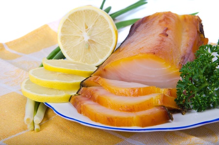 kipper with greens on plate