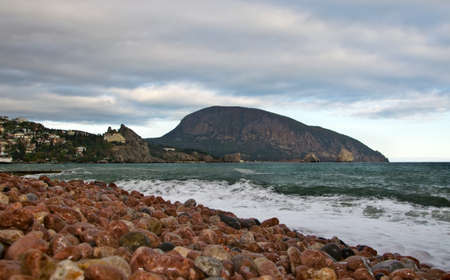 pebble and wave in coastの写真素材