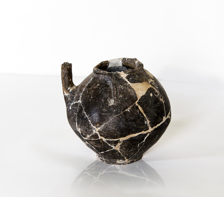fragments of destroyed ancient pottery from the excavationsのeditorial素材