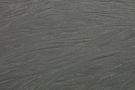Closeup of beach sand texture background.
