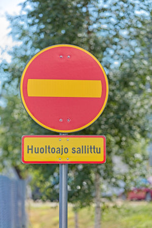 Prohibition sign: No entry, maintenance driving allowed (Huoltoajo sallittu) in Finland.
