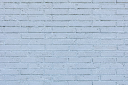 Closeup of white brick wall background texture.