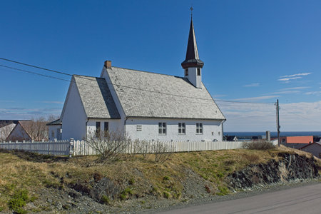 View of wooden BerlevÃ¥g church on a clear summer day, BerlevÃ¥g, Norway.の写真素材