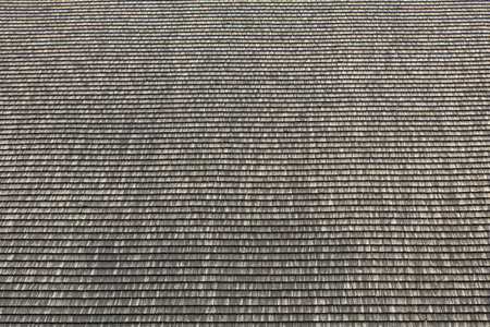 Large, uniform expanse of weathered wooden roof shingles arranged in neat horizontal rows, Sieppijarvi, Lapland, Finland, Europe.
