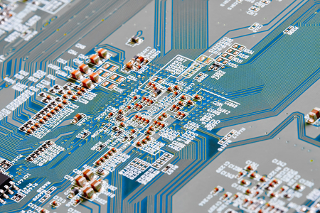 Electronic circuit board close up.