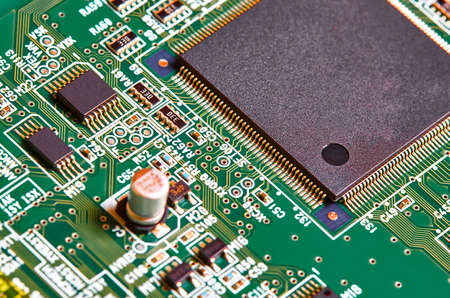 Electronic circuit board close up.